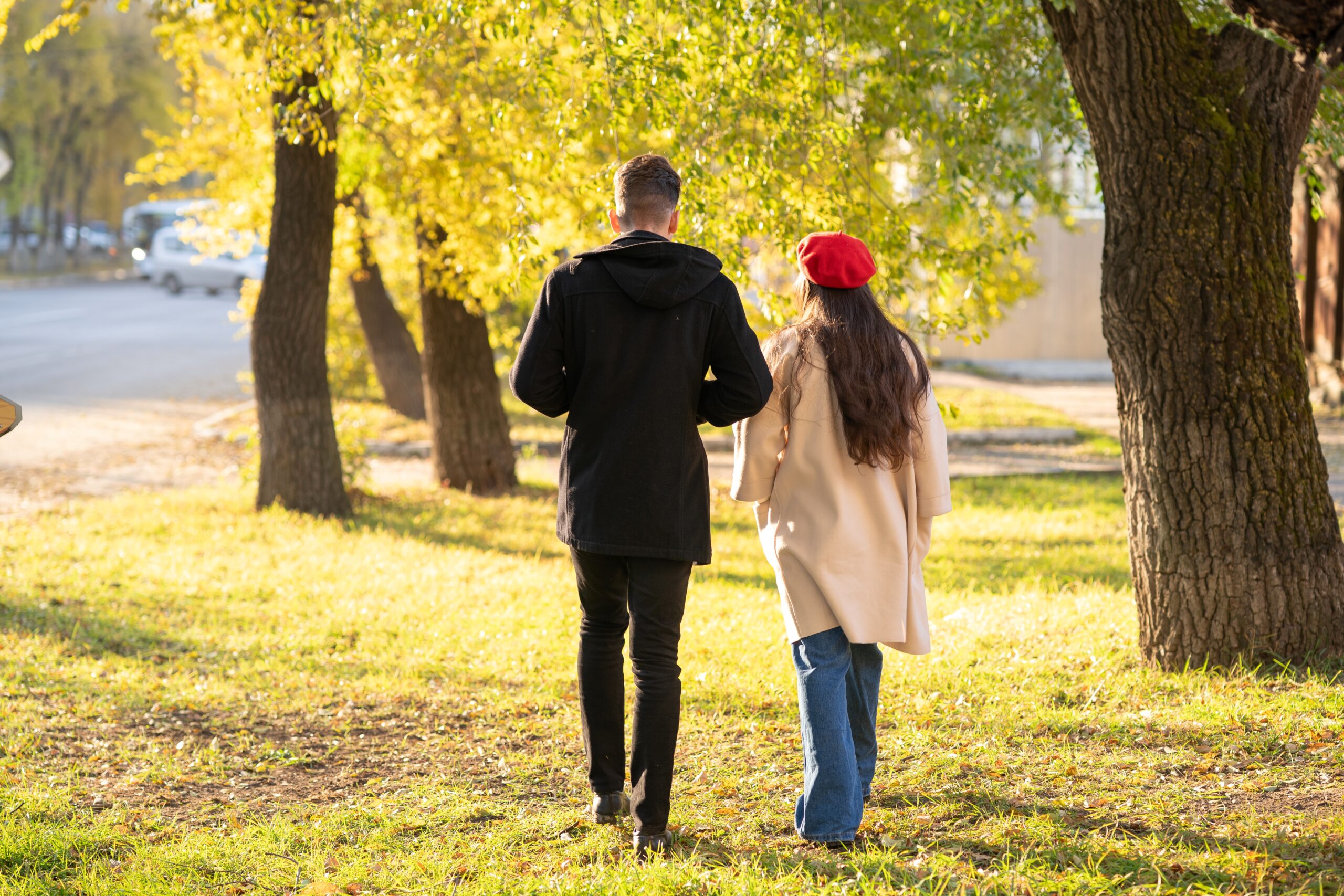 Cheap Third Date Ideas - Fun Outings That Won’t Empty Your Wallet - couple walking in autumn