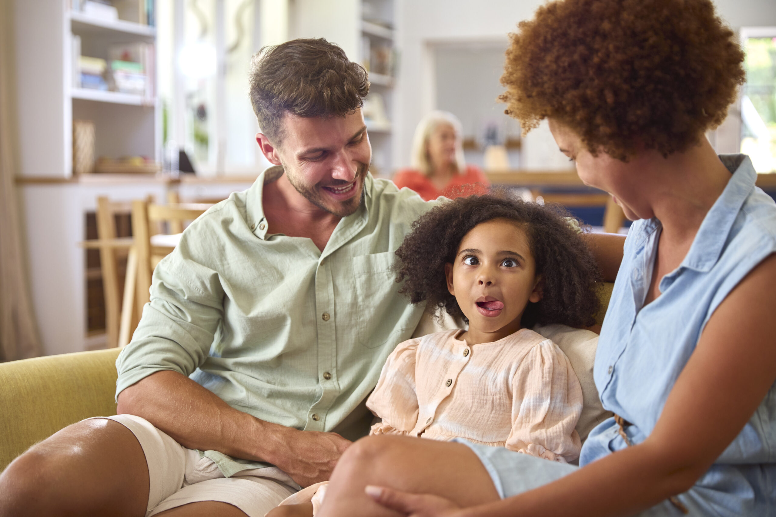 Co-Parenting and New Relationships - family with kids on sofa