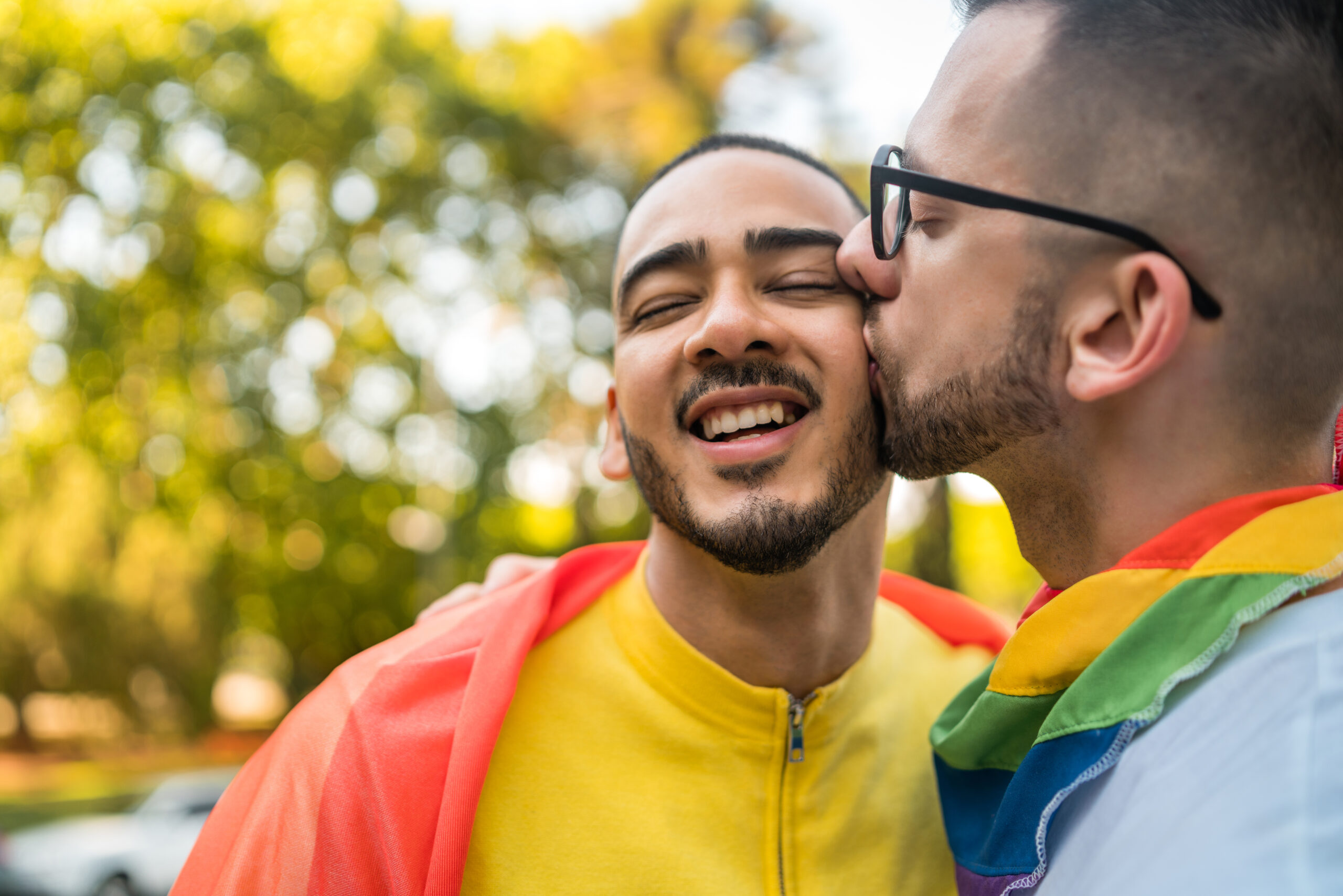 Coming Out and Finding Love - gay couple embracing
