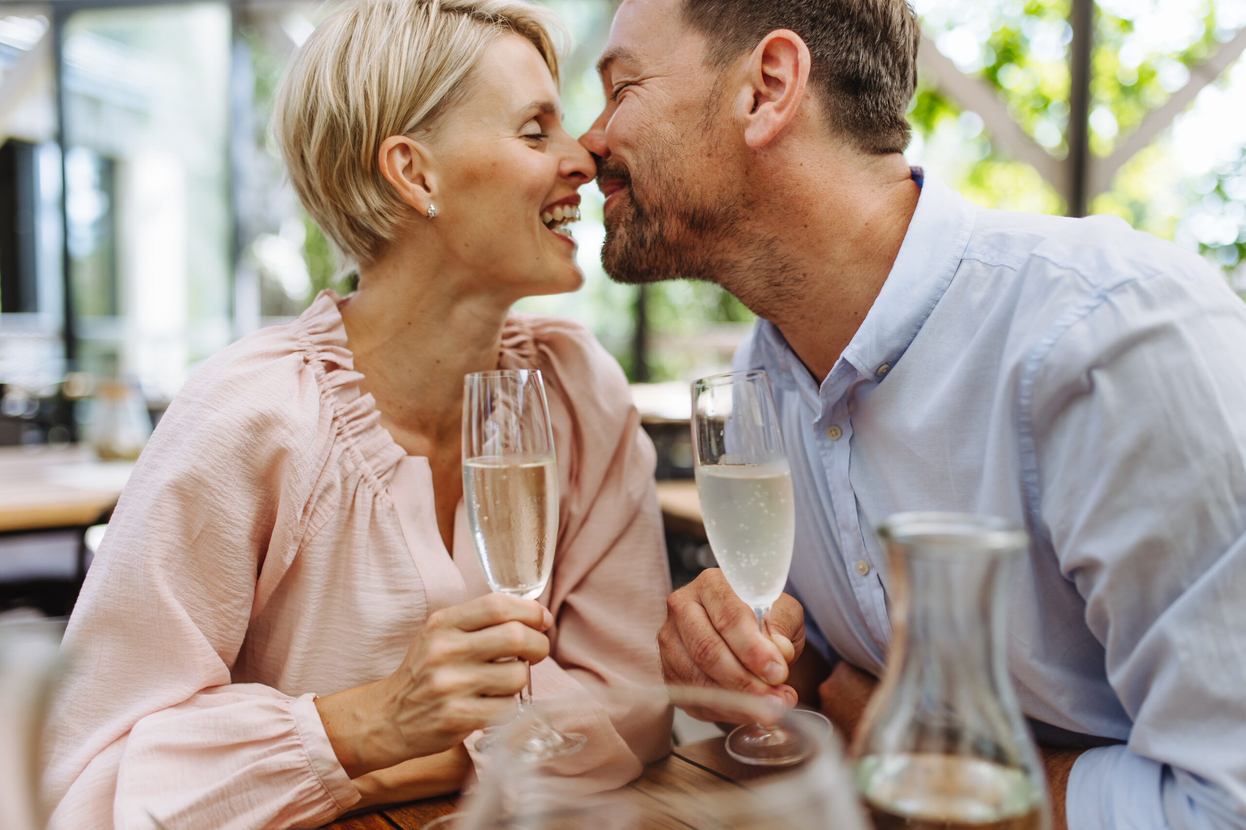 Divorced Dating for Over 40s - How to Rebuild Confidence and Discover Love Anew - couple in restaurant