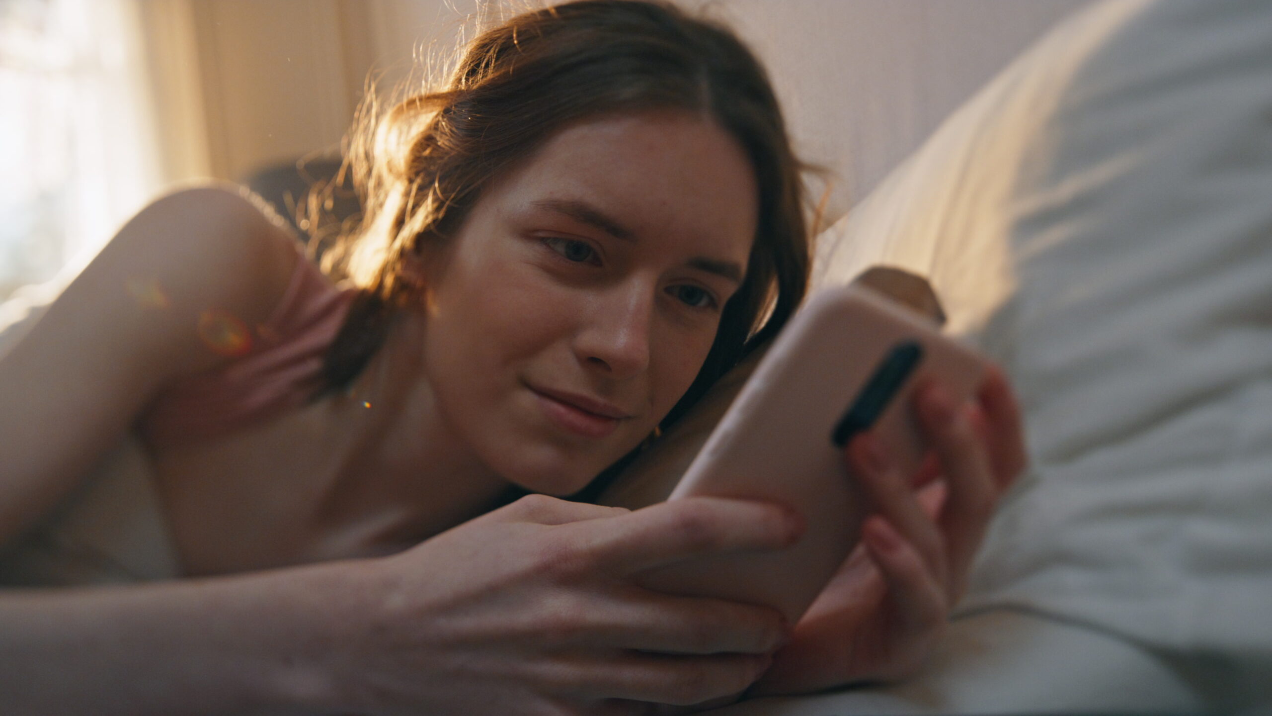 Sexting Safety for Teenagers - sleepy girl on phone