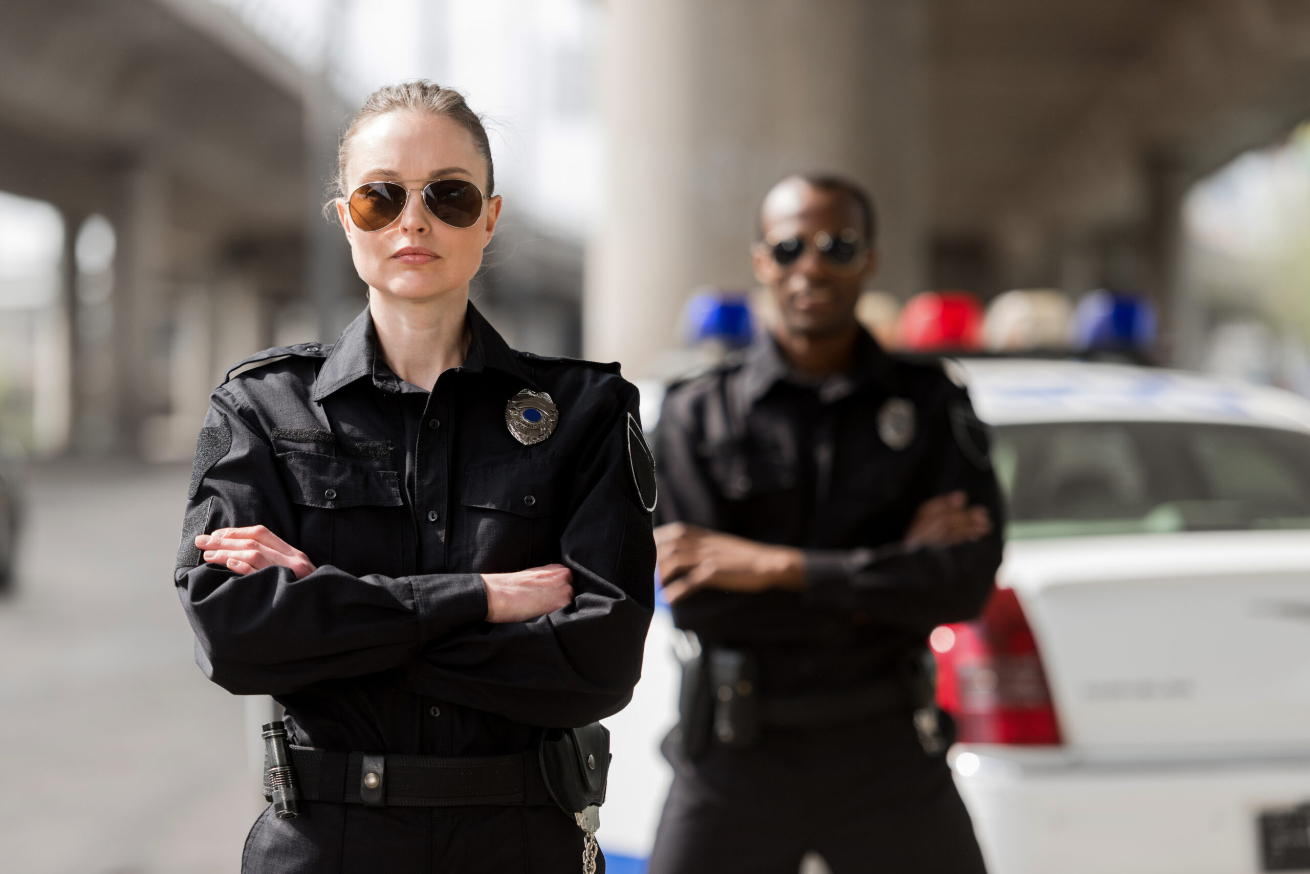 Things to Consider When Dating a Police Officer in the UK - police crossed arms pose